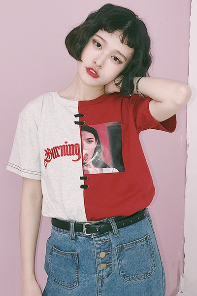 Ενδιαφέρουσες ευρύ-shirt για τις γυναίκες με 3/4 μανίκια και ενδιαφέρουσα σχεδίαση