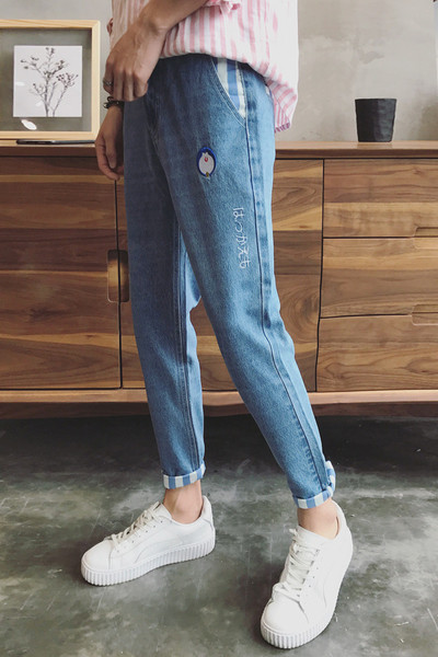 Σούπερ σύγχρονο αρσενικό στενό τζιν με πιγκουίνος εφαρμογή και υψηλή μέση