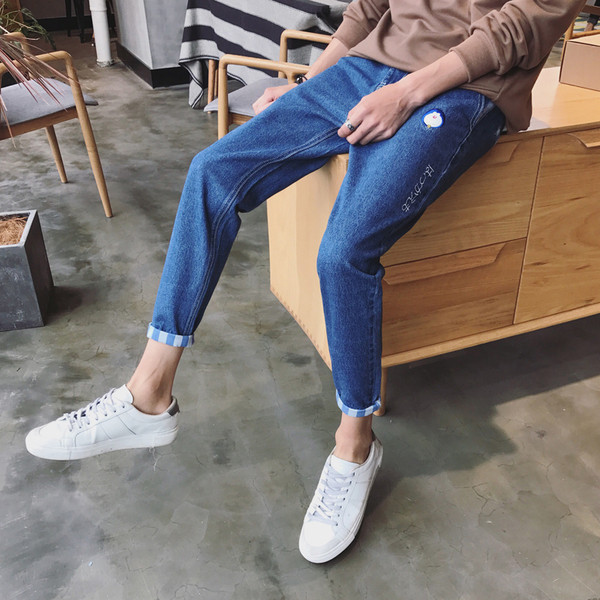 Σούπερ σύγχρονο αρσενικό στενό τζιν με πιγκουίνος εφαρμογή και υψηλή μέση