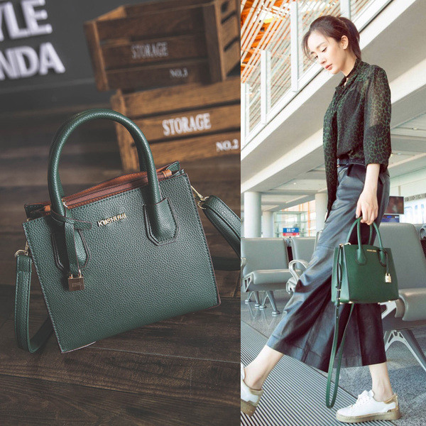 Κομψή τσάντα κατάλληλη για τη μεταφορά στο χέρι και τον ώμο