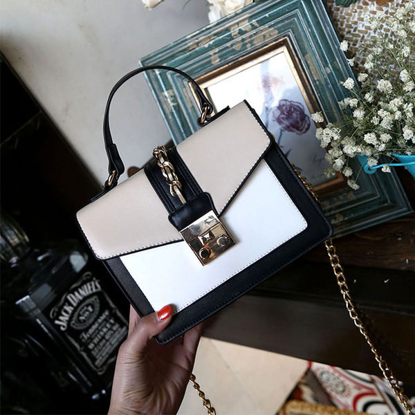 Δερμάτινη τσάντα με ιριδίζοντα χρώματα με μακρύ χερούλι