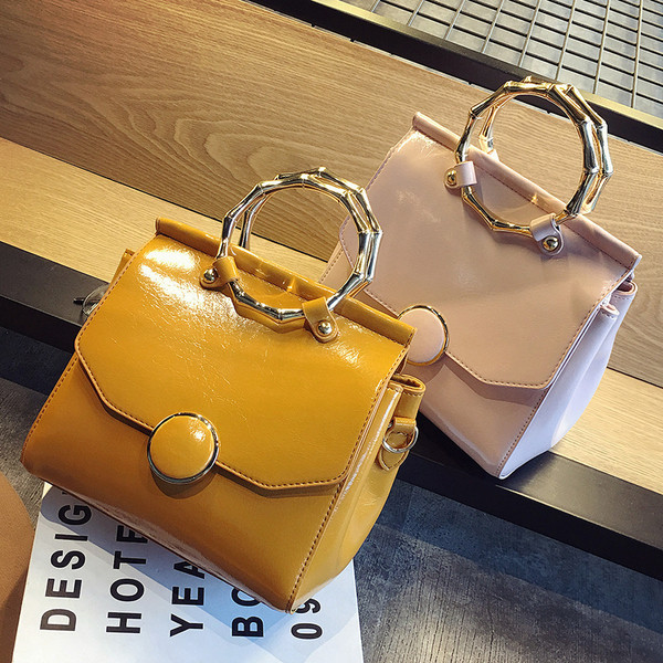 Стилна кожена ръчна дамска чанта в пет различни цвята