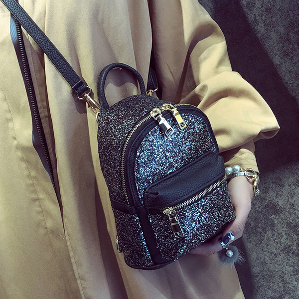 Γυναικείο σακίδιο που καλύπτονται από πούλιες σε τέσσερα διαφορετικά χρώματα