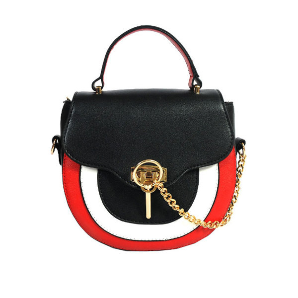 Стилно дамско куфарче с много интересна закопчалка