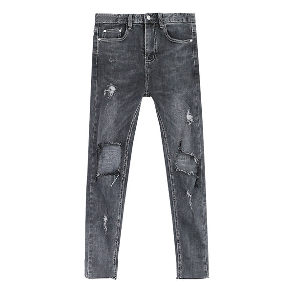 τζιν σύγχρονες γυναίκες με σκισμένα γόνατο και 7/8 πόδι