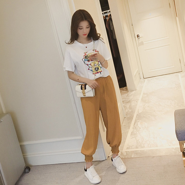 Μπλούζες με κοντό μανίκι και απλικέ μαύρο και άσπρο