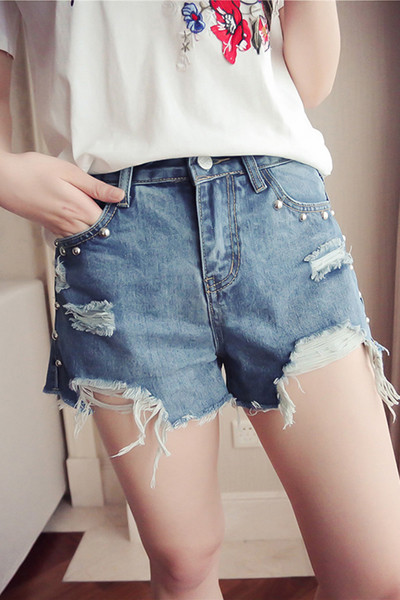 Страхотни дънкови дамски панталони с ресни и мъниста по джобовете