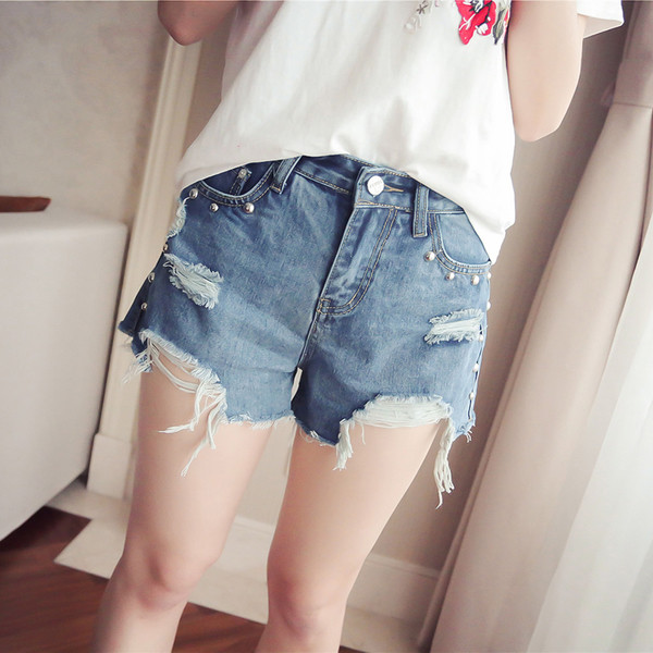 Страхотни дънкови дамски панталони с ресни и мъниста по джобовете