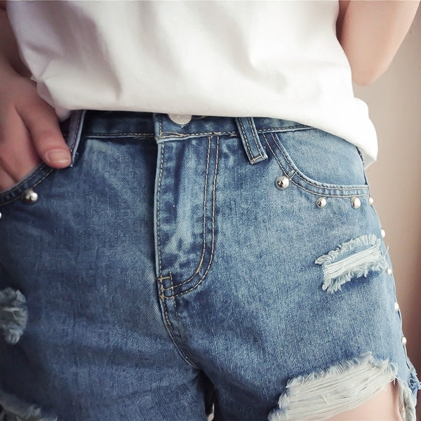 Страхотни дънкови дамски панталони с ресни и мъниста по джобовете