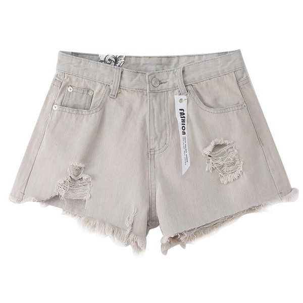 Οι γυναίκες σύντομο τζιν με σχισμένο παντελόνι