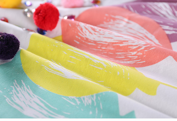 Бузка с къс ръкав и шарени елементи с много интересно завързване 