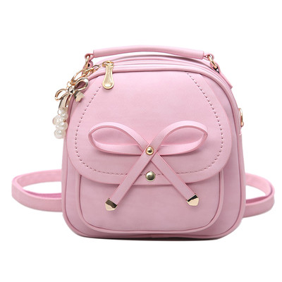 Γυναικείο ακίδιο ιμάντα ώμου πάνω από τον ώμο της σε τρία χρώματα