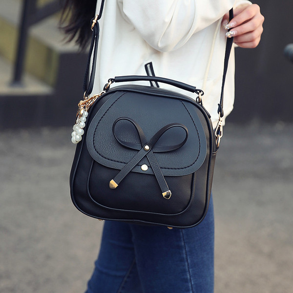  Γυναικείο ακίδιο ιμάντα ώμου πάνω από τον ώμο της σε τρία χρώματα