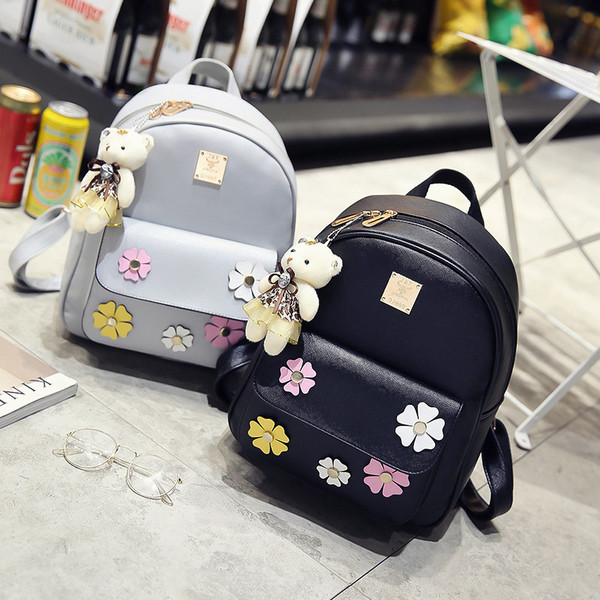 Δερμάτινο σακίδιο με την καθημερινή εφαρμογή των λουλουδιών