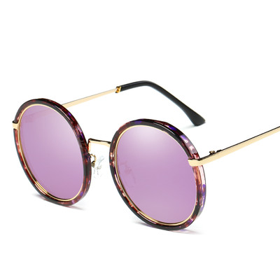 Κομψό γυαλιά ηλίου με στρογγυλά γυαλιά και λεπτό σκελετό
