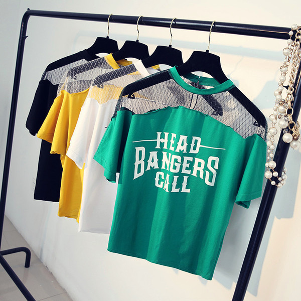 Ευρεία κυρίες μπλούζα με κοντά μανίκια με πλέγμα στην κορυφή