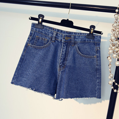 Κυρίες σύντομη παντελόνι τζιν με υψηλή μέση και όμορφα κεντήματα στο πίσω τσέπη