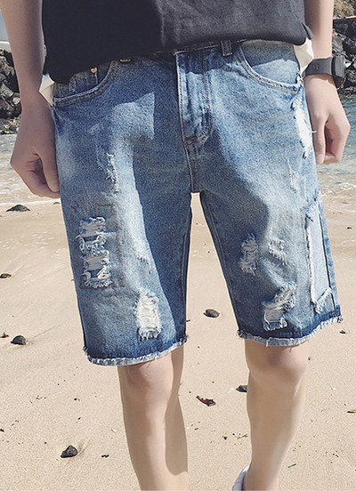 Χτύπησε το μοντέλο του καλοκαιριού παπούτσια τζιν παντελόνι ελαφρώς τράβηξε