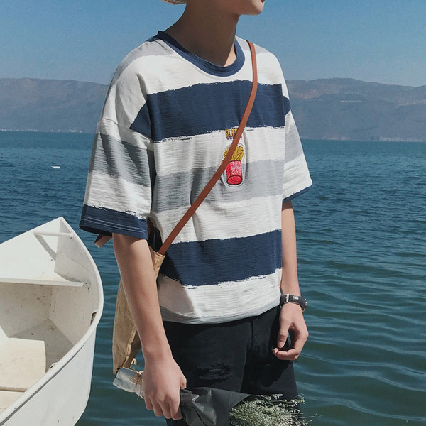 Ευρεία μπλούζα με ιριδίζοντα χρώματα με πολύ ενδιαφέρον κέντημα στο στήθος