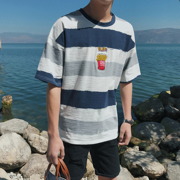 Ευρεία μπλούζα με ιριδίζοντα χρώματα με πολύ ενδιαφέρον κέντημα στο στήθος