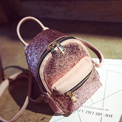 Γυναικείο σακίδιο που καλύπτονται από πούλιες σε τέσσερα διαφορετικά χρώματα