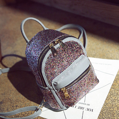 Γυναικείο σακίδιο που καλύπτονται από πούλιες σε τέσσερα διαφορετικά χρώματα