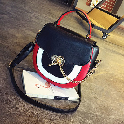 Стилно дамско куфарче с много интересна закопчалка