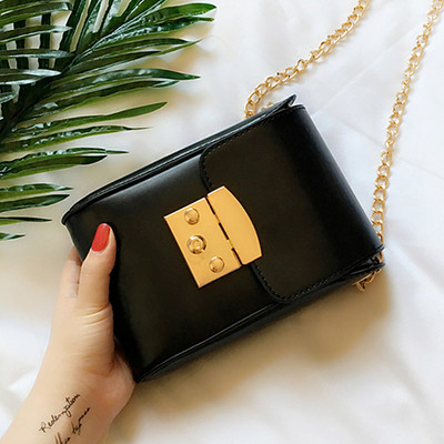 Τσάντα που μοιάζει με πορτοφόλι με ένα μακρύ βραχίονα λαβή μαύρο και καφέ