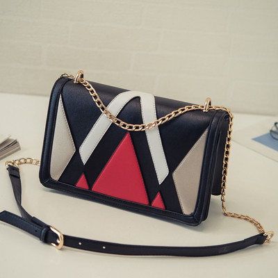 Γυναικεία μίνι τσάντα με ραφές