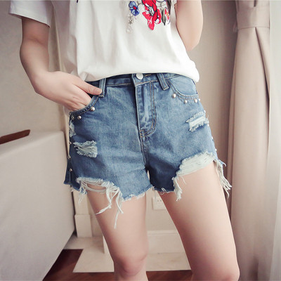 Страхотни дънкови дамски панталони с ресни и мъниста по джобовете