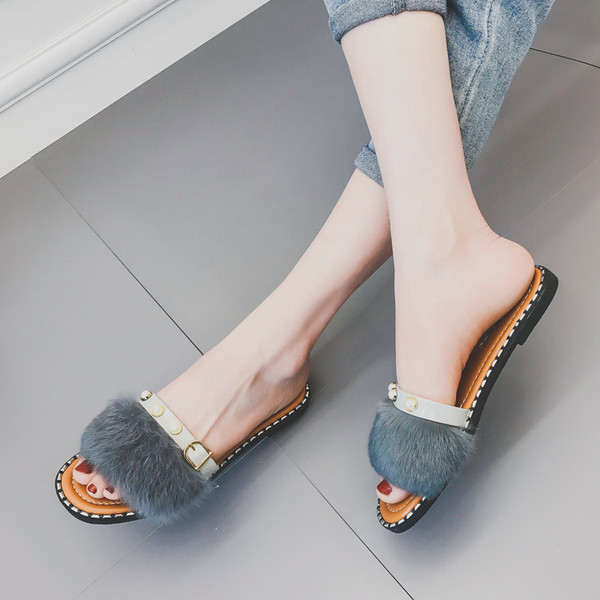 Γυναικείες παντόφλες με γούνα και πολύ όμορφα μαργαριτάρια