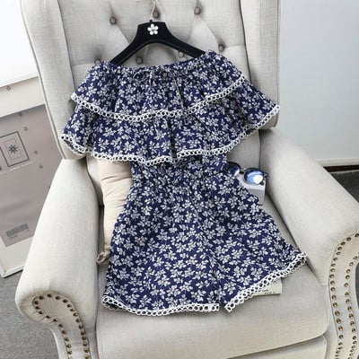 Οι γυναίκες φρέσκα αμάνικο jumpsuit και floral