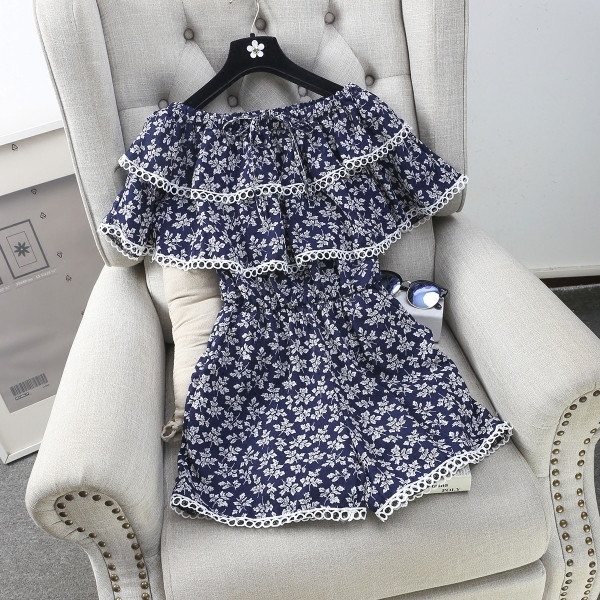 Οι γυναίκες φρέσκα αμάνικο jumpsuit και floral