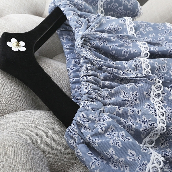 Οι γυναίκες φρέσκα αμάνικο jumpsuit και floral