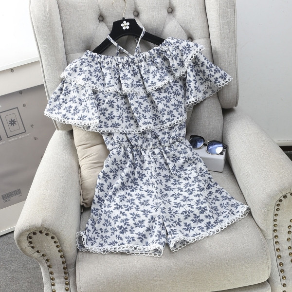 Οι γυναίκες φρέσκα αμάνικο jumpsuit και floral