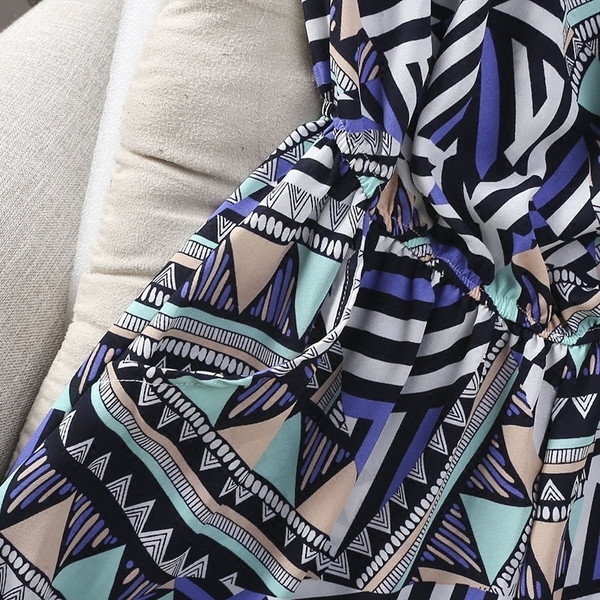 Цветен дамски гащеризон в широк модел и с джобове