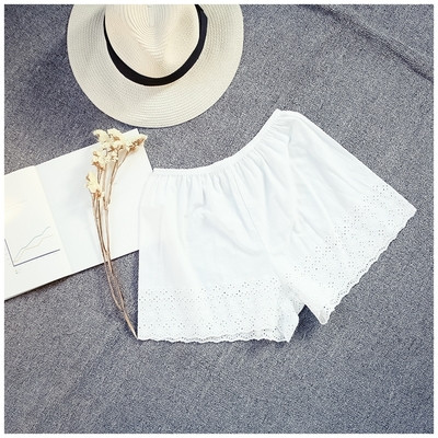 Σύντομη ελαστική κυρίες παντελόνι με λεπτομέρειες δαντέλα σε μαύρο και άσπρο