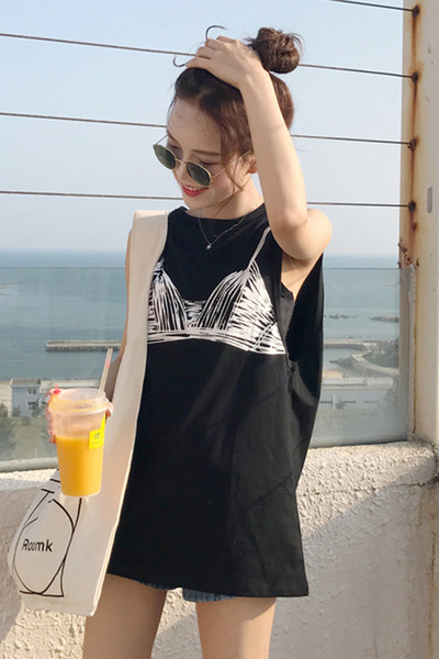 Дълъг дамски модерен потник с нестандартна апликация