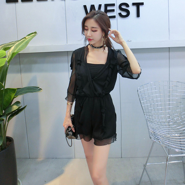 Σύντομη κυρίες jumpsuit με διαφανή μανίκια πλέγματος