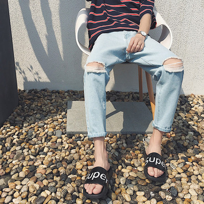 Κομψή κάνει παντελόνι τζιν κατακερματισμένη αρσενικό