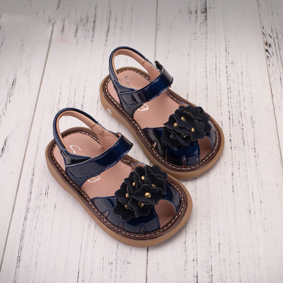 Παιδικά σανδάλια για τα κορίτσια σε χρυσό και μπλε διακόσμηση λουλούδι