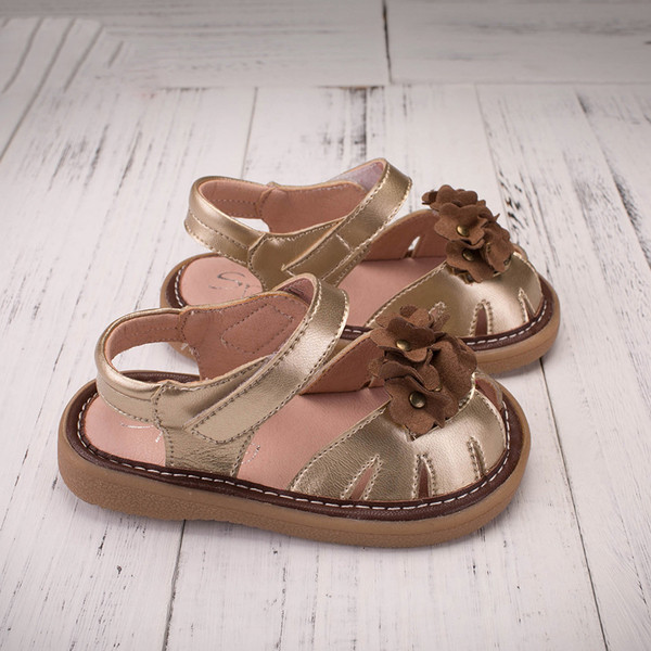 Παιδικά σανδάλια για τα κορίτσια σε χρυσό και μπλε διακόσμηση λουλούδι