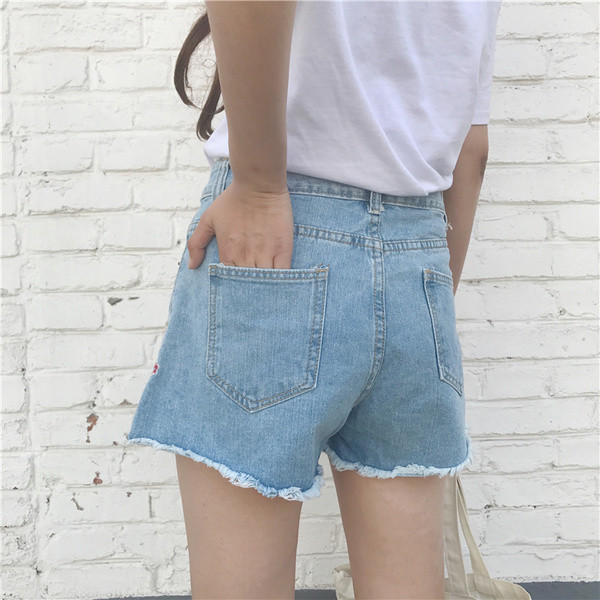 Σύντομο σύγχρονο κυρίες παντελόνι με υψηλή μέση και κεντημένα λουλούδια