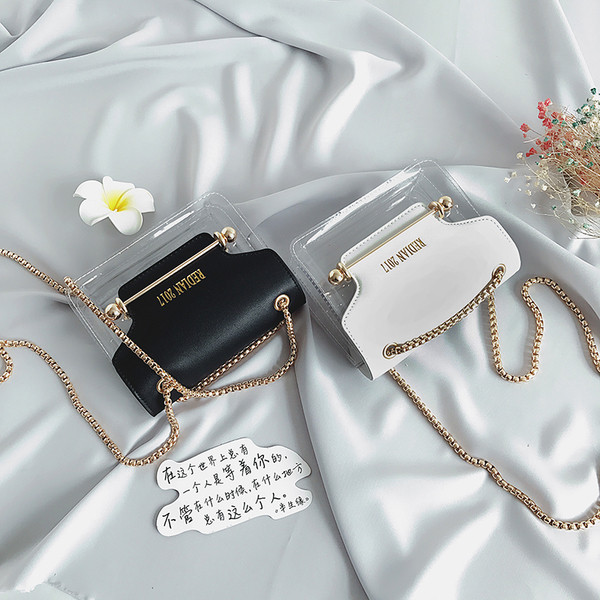 Модерна мини чанта с метална дръжка и прозрачно дъно, в бял, черен и розов цвят