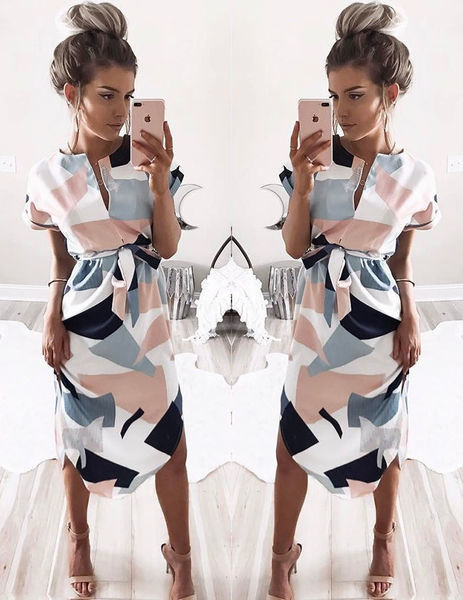 Σύγχρονη έγχρωμο κυρίες φόρεμα με μήκος γόνατο