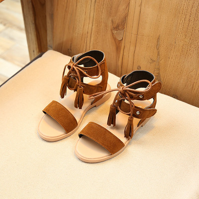 Ενδιαφέρουσες σανδάλια με μακρά δεσμούς γύρω από τον αστράγαλο για τα κορίτσια - 3 χρώματα