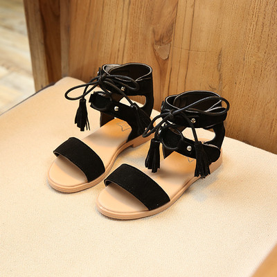 Ενδιαφέρουσες σανδάλια με μακρά δεσμούς γύρω από τον αστράγαλο για τα κορίτσια - 3 χρώματα