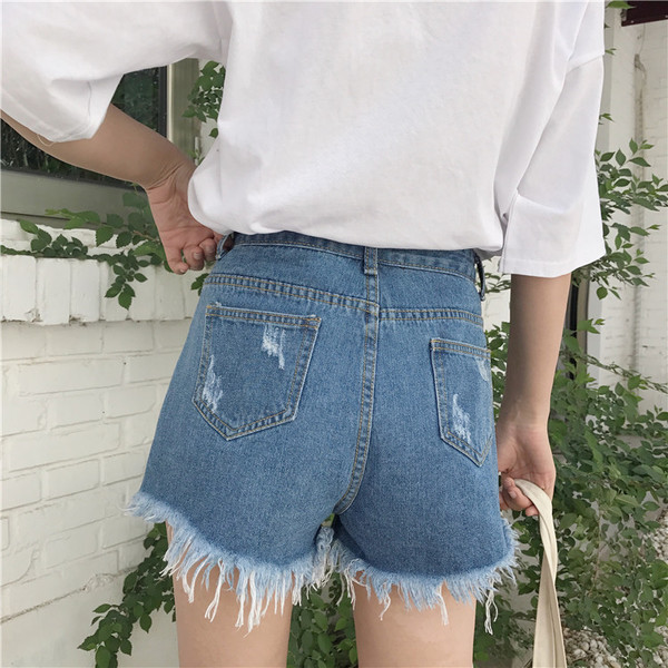 Κυρίες σύντομο παντελόνι τζιν σε στυλ ρετρό με βλεφαρίδες στα άκρα των ποδιών