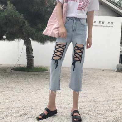 Γυναικεία τζιν με μήκος 7/8 με κορδόνια στα γόνατα