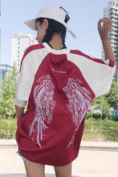 Στυλ πουκάμισο “Wide κυρίες φίλος” με φτερά κεντημένα πίσω